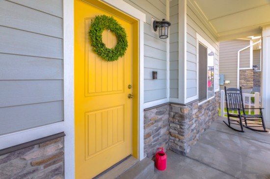 Replacing or painting a front door improves curb appeal for a relatively low cost