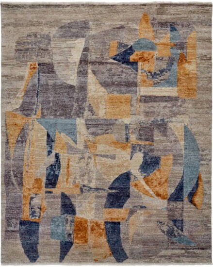 Influenced by the cubism art movement, and hand-knotted in luxurious silk and wool, this modern work of art brings elegance and sophistication to any decor.