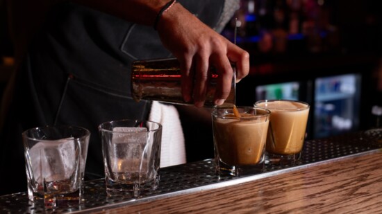 Pouring the Gran Centenario tequila drinks.