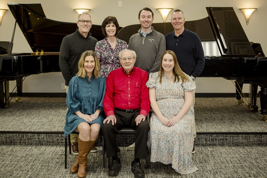 Front row (left to right): Mitzi, Ted, and Ellie. Back row: Tom, Susan, John, and Mike