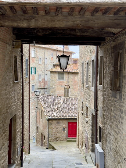 Strolling through the timeless streets of Cortona, setting of Frances Mayes’ Under the Tuscan Sun