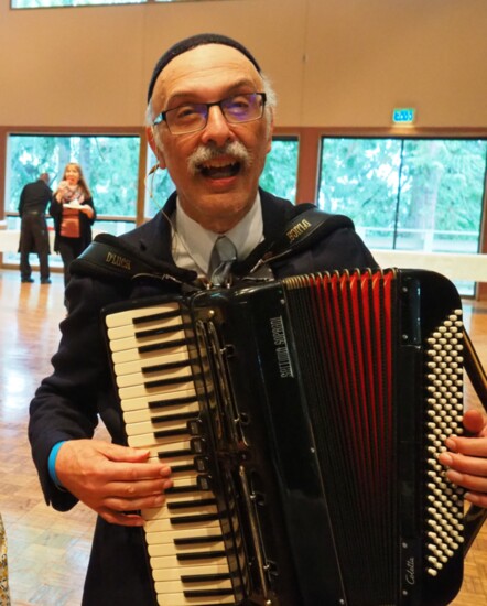 Brad playing the accordion (Photographer: Glindon Marten)