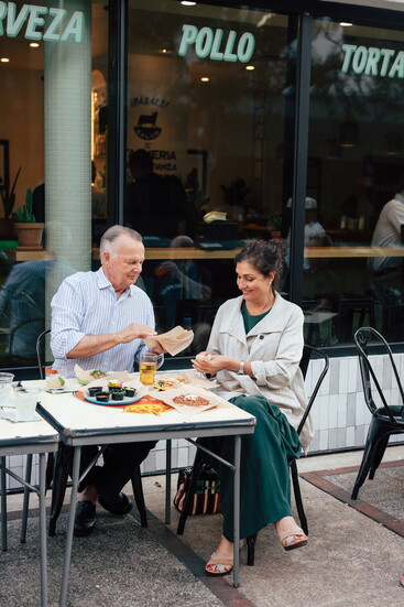 Frank and Pardis Stitt dining at Salud, where their influence lingers on the menu and in the spirit of hospitality.