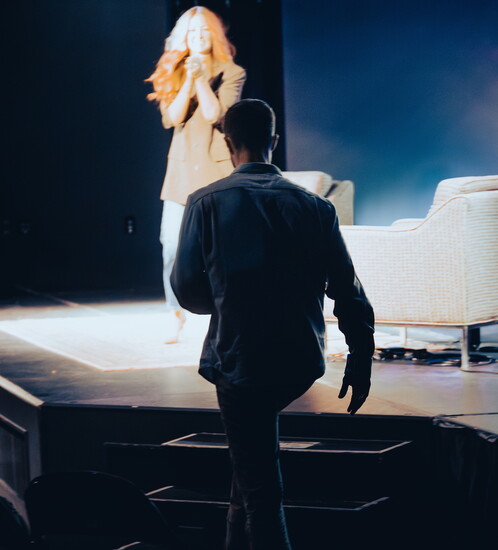 Troy steps on the stage at Seacoast Stories Live!