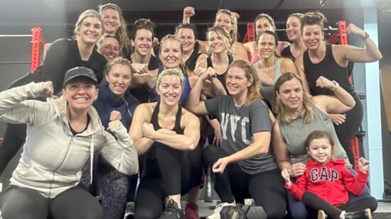 Krista Williams (front row; left) with fellow mothers/clients.