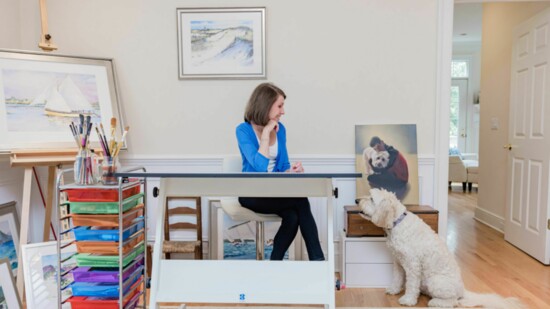 Wendy in her studio, getting some inspiration from her sweet dog, Ella.