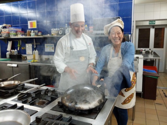 Learning to cook traditional “lomo saltado” with Chef Nacho on the Taste of Peru Tour.