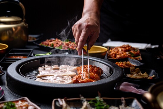 Galbi Pork Belly and Spicy Gangnam Chicken on Grill. Photo by Jenn Duncan