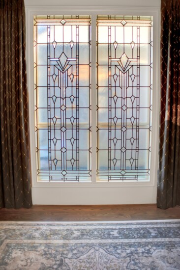 The Kelley family home dining room window is a pretty focal point and provides privacy.