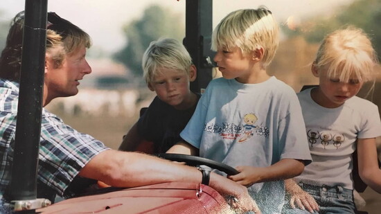 Mark talking to Wybrand, John, & Kerina as they worked on dairy