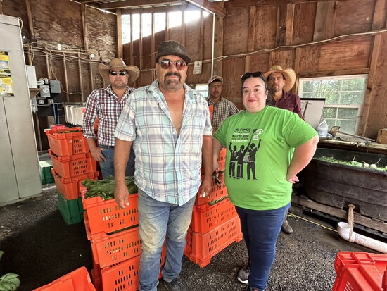 Fernbrook Farm farmers with CASA Freehold director Dolly Hernandez
