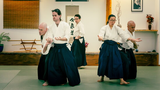 Students practicing their form during class