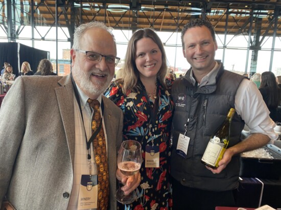 Doug with Devotees Jon and Cori Phillips, Owners of The Wine Reserve at Waterford With a Bottle of Steel Magnolias