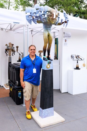 Thomas Wargin and his Best In Show Sculpture. Photo by John Hallet.