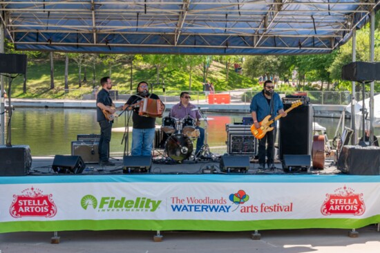 Stage performances and talented entertainers delight audiences at The Woodlands Waterway Art Festival.