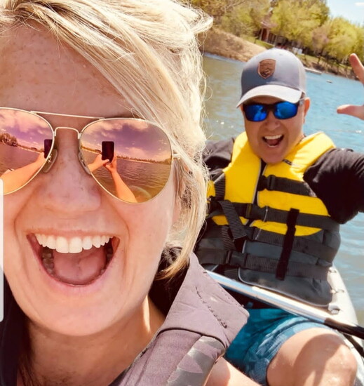 Kristina and husband, Ron, on the river