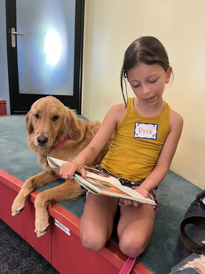 Ryin Rose reads to Annie Oakley
