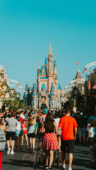 A family strolling toward the castle