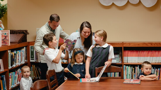 The Burns family, together in the school library.