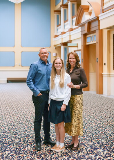 The Larson family: Lexie with her parents.