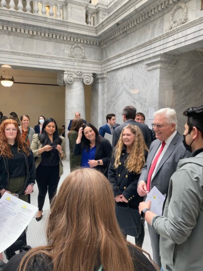 Lowry meeting with students at the Utah State Capitol Building