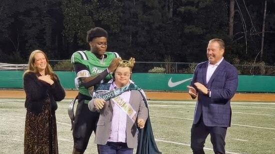 Trey giving Jake the Homecoming crown
