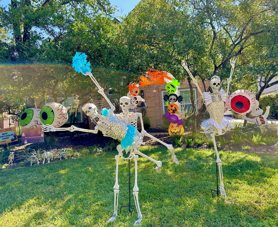 Cheerleaders are front and center in the DeGuerre front yard.