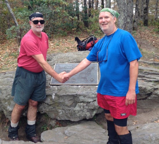 The hiking buddies celebrate the end of the trail in October, 2013
