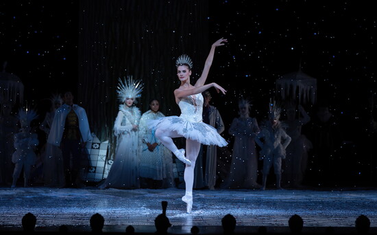 Houston Ballet Soloist Jacquelyn Long with Artists of Houston Ballet and Students of Houston Ballet Academy in Stanton Welch’s The Nutcracker.  Photo by Amitava