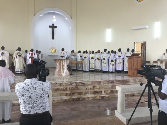 A choir performs in the sanctuary of the new church at St. Joseph University in Tanzania.