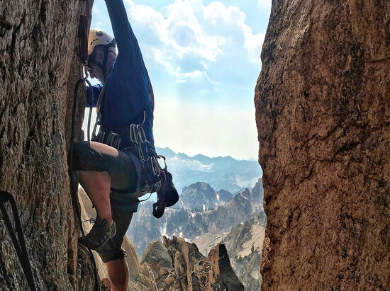 limbing the final pitch of Stur Chimney on Mount Hepburn, Idaho.