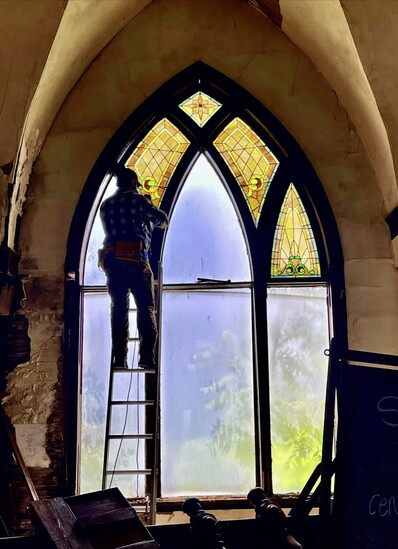 Garlan taking a church window down in Culleoka, TN