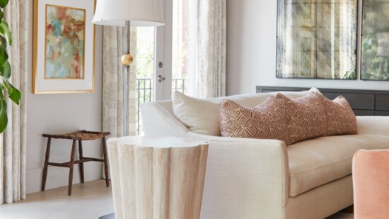Signature vintage stool alongside custom artwork provide elegant finishes.