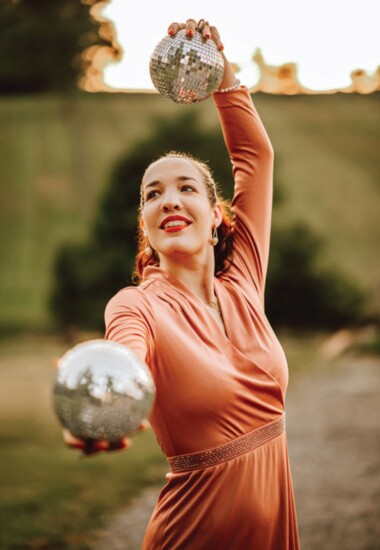 Everyone is playing life-size Barbie this fall thanks to Greta Gerwig’s film—a ‘60s pink frock with silver beading is perfect for any smart occasion. (Umba for 