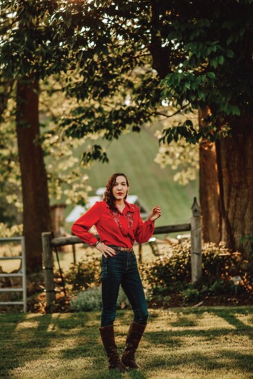 A 1970s embroidered blouse paired with jeans & boots creates a feminine Western look.  (SK & Company blouse, Vintage MC, $29)