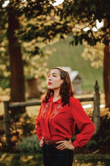 A 1970s embroidered blouse paired with jeans & boots creates a feminine Western look.  (SK & Company blouse, Vintage MC, $29)