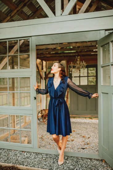 Flowing ruffles, diaphanous sleeves, and a tie waist serve ballerina vibes in this 1970s navy cocktail dress. (Unlabeled, model’s own)