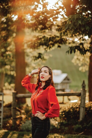 A 1970s embroidered blouse paired with jeans & boots creates a feminine Western look.  (SK & Company blouse, Vintage MC, $29)