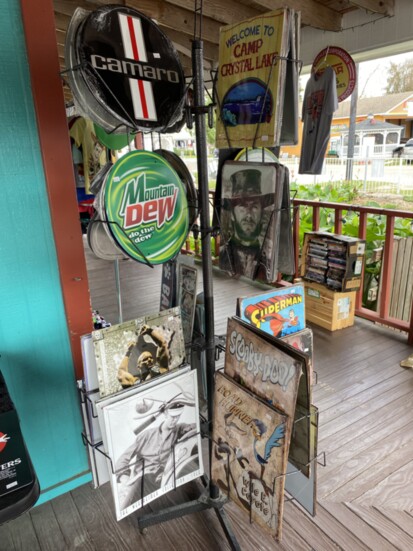 Collectible metal signs at Pops Toys