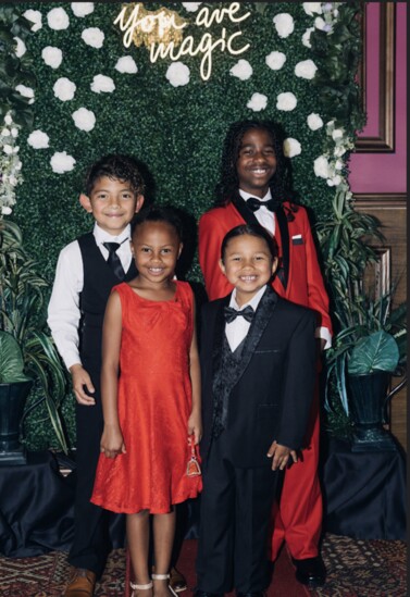 Performers Boniek and Roshawn Hernandez, who performed, in front, with  Roshawn's siblings Sierra and Xaevian Brown