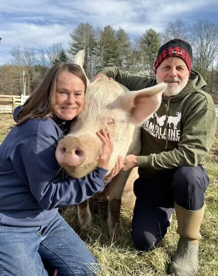 Peter and his wife Gaby who own the sanctuary with their pig Albee. 