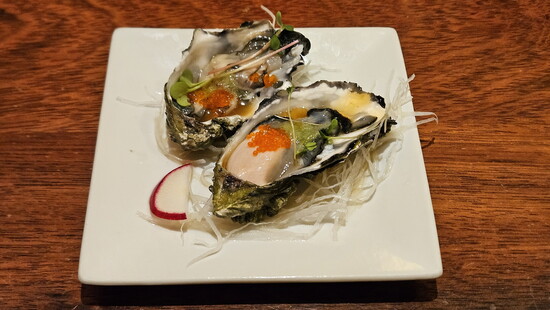 Oyster Shooters: Topped with cucumber-lemon shaved ice, chili paste, and tobiko.