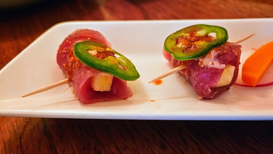 Tuna Pineapple: Quick seared ahi, fresh cut pineapple, chili garlic sauce, and jalapeño.