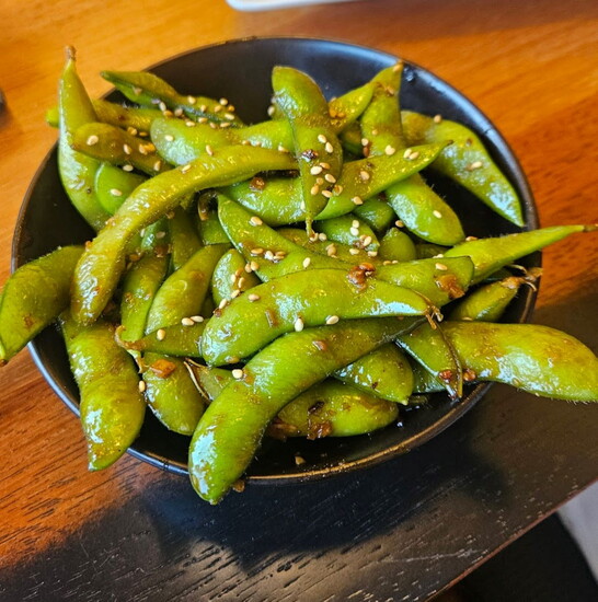 Garlic Edamame: Sauteed soybeans in the pod, garlic, soy, and sake