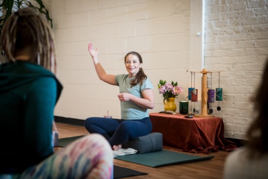 Georgia Lynn leads a class at Total Practice Yoga. 