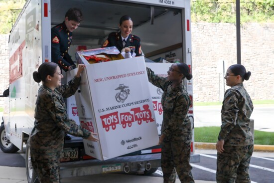 Toys that have been donated are taken to a central location for sorting and distribution.