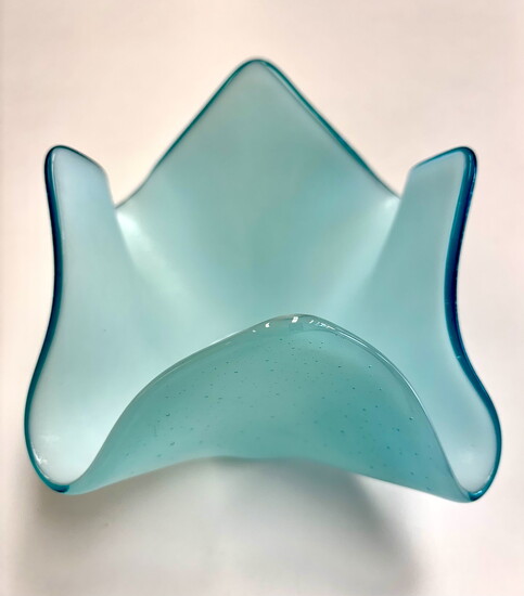 This luminous glass vase catches the light—and the spirit—of the season at Collectors Gallery & Framery.