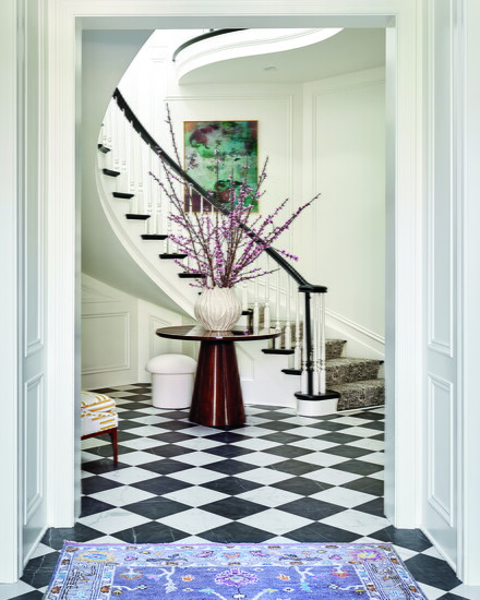 The stairwell features a painting by Bernard Childs. 