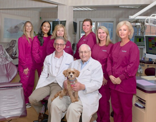 The Opin Wide! Team, including certified therapy dog Lucy