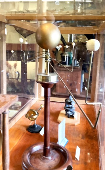 Lacking both Neptue and Pluto (not discovered until 1845,) this rotating model is from the Sharon School for Girls Orrey